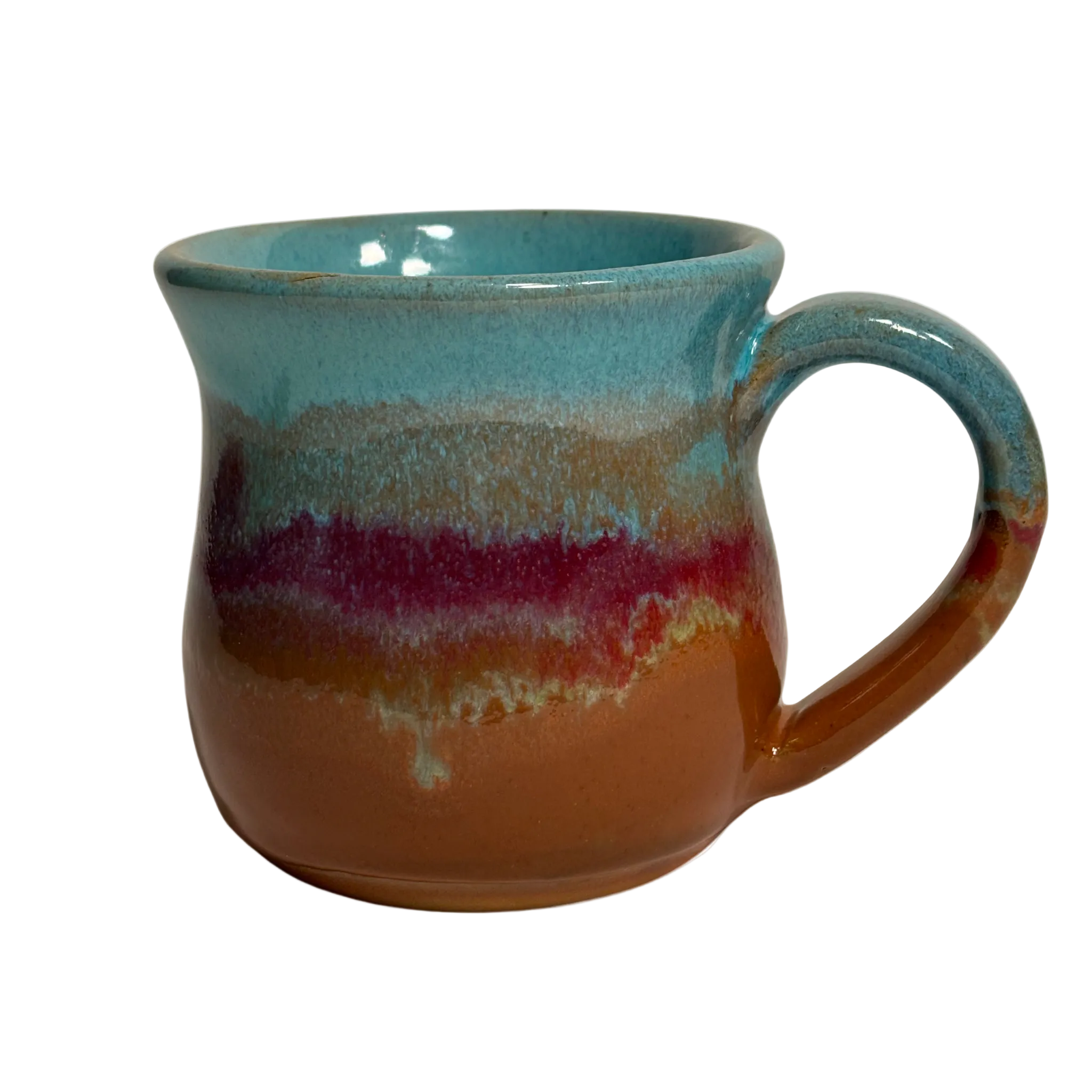 Handmade ceramic mug with turquoise, red, and clay-toned glaze