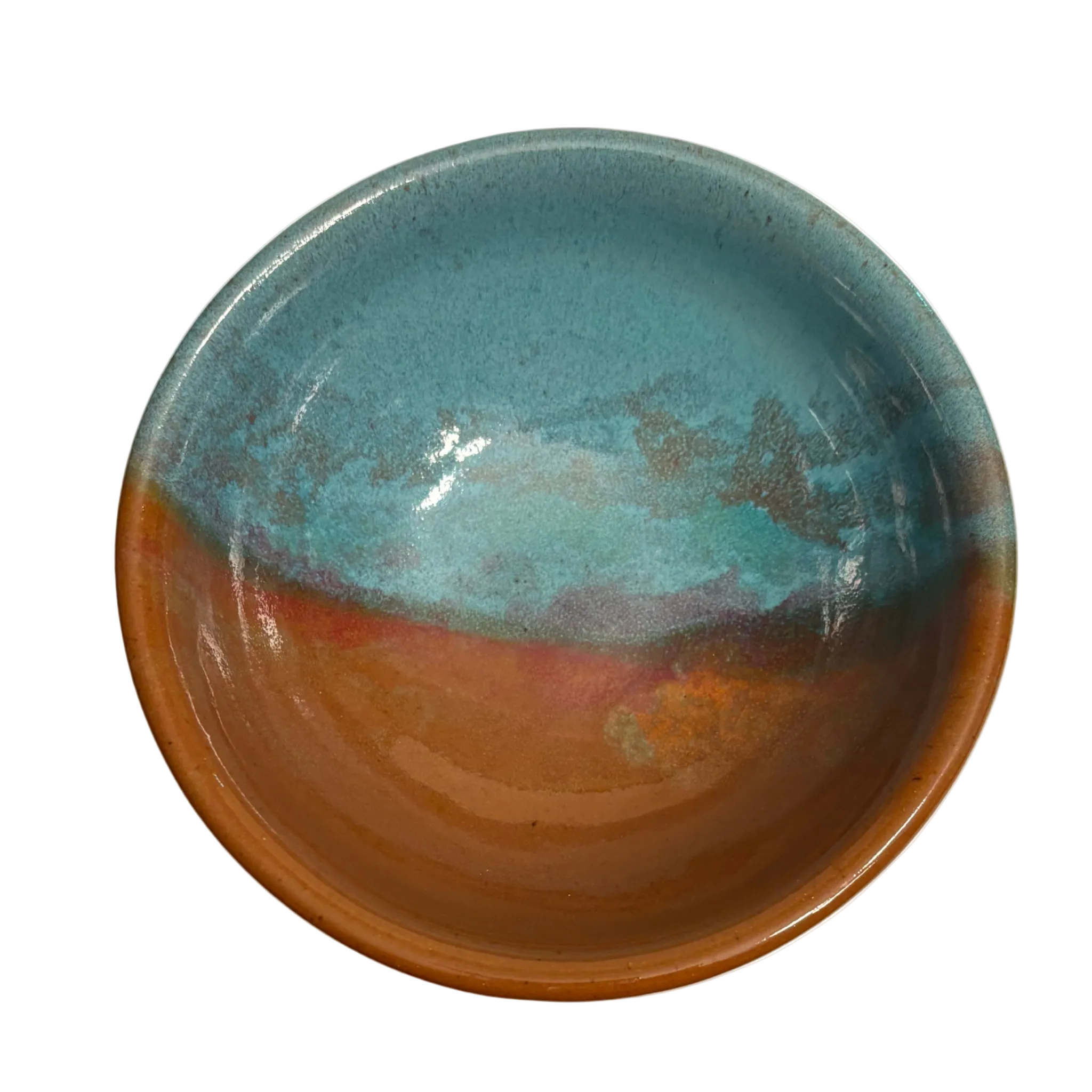 Desert Sky handmade ceramic salad bowl with turquoise interior and warm rust glaze resembling desert sunset tones.