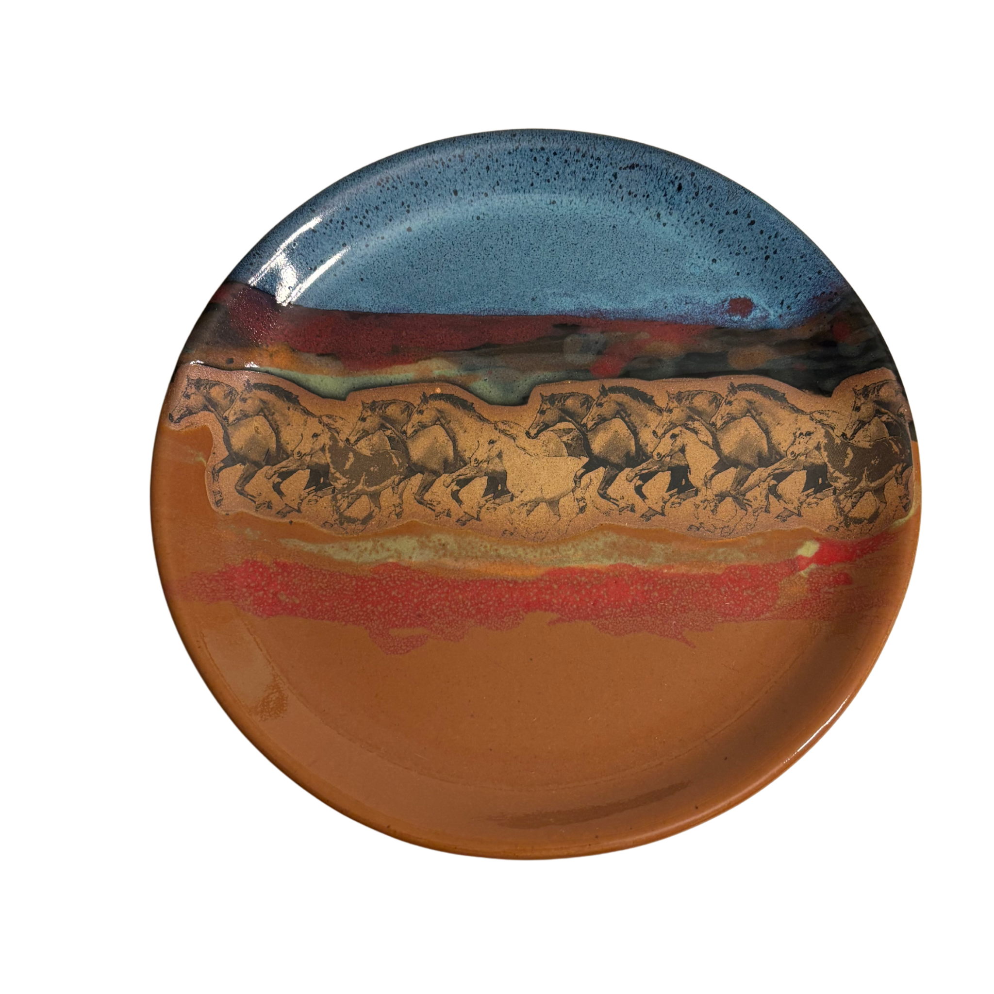 Handmade ceramic dinner and salad plates with running horse artwork and layered desert glaze.