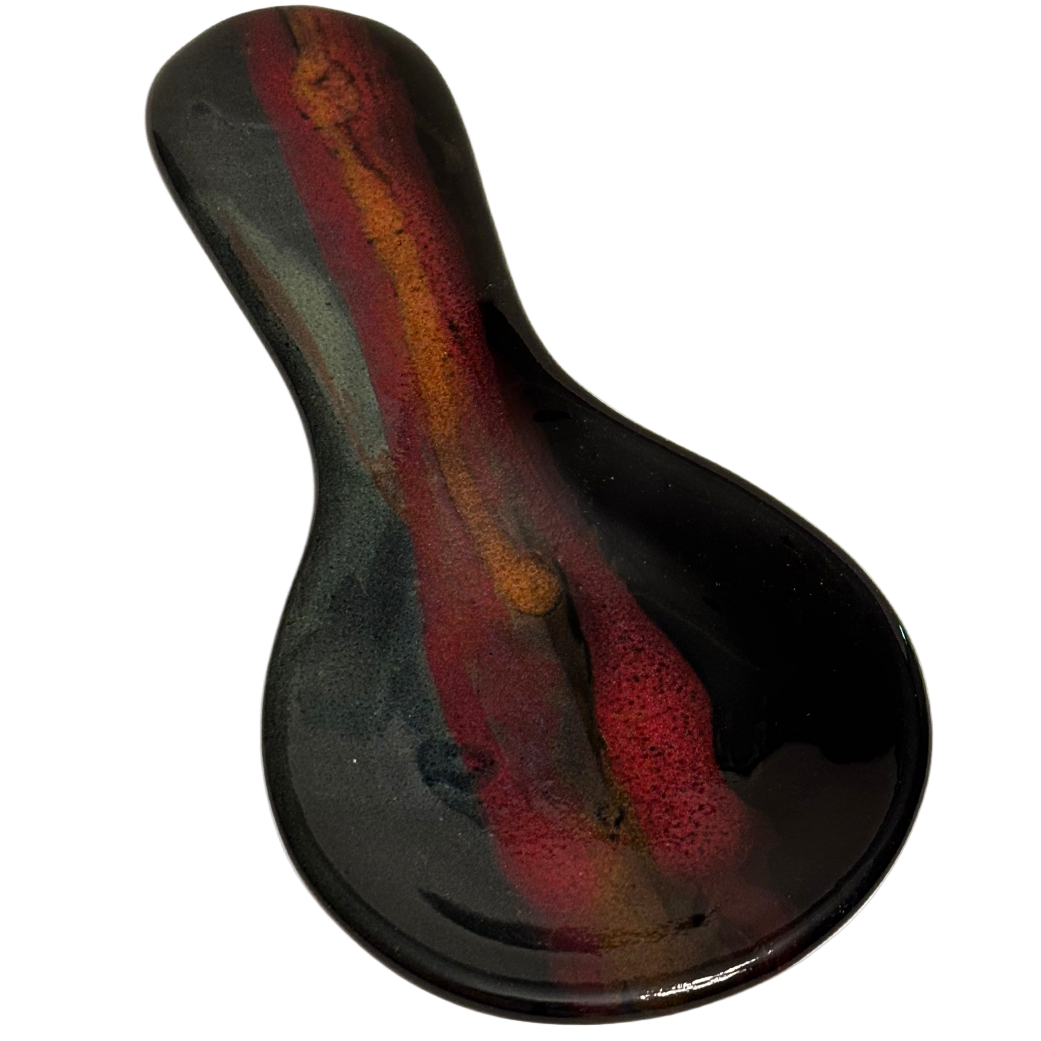 Handmade Jasper Wilderness ceramic spoon rest for kitchen counters, with black glaze, earthy red, and golden tones inspired by mountain sunsets.