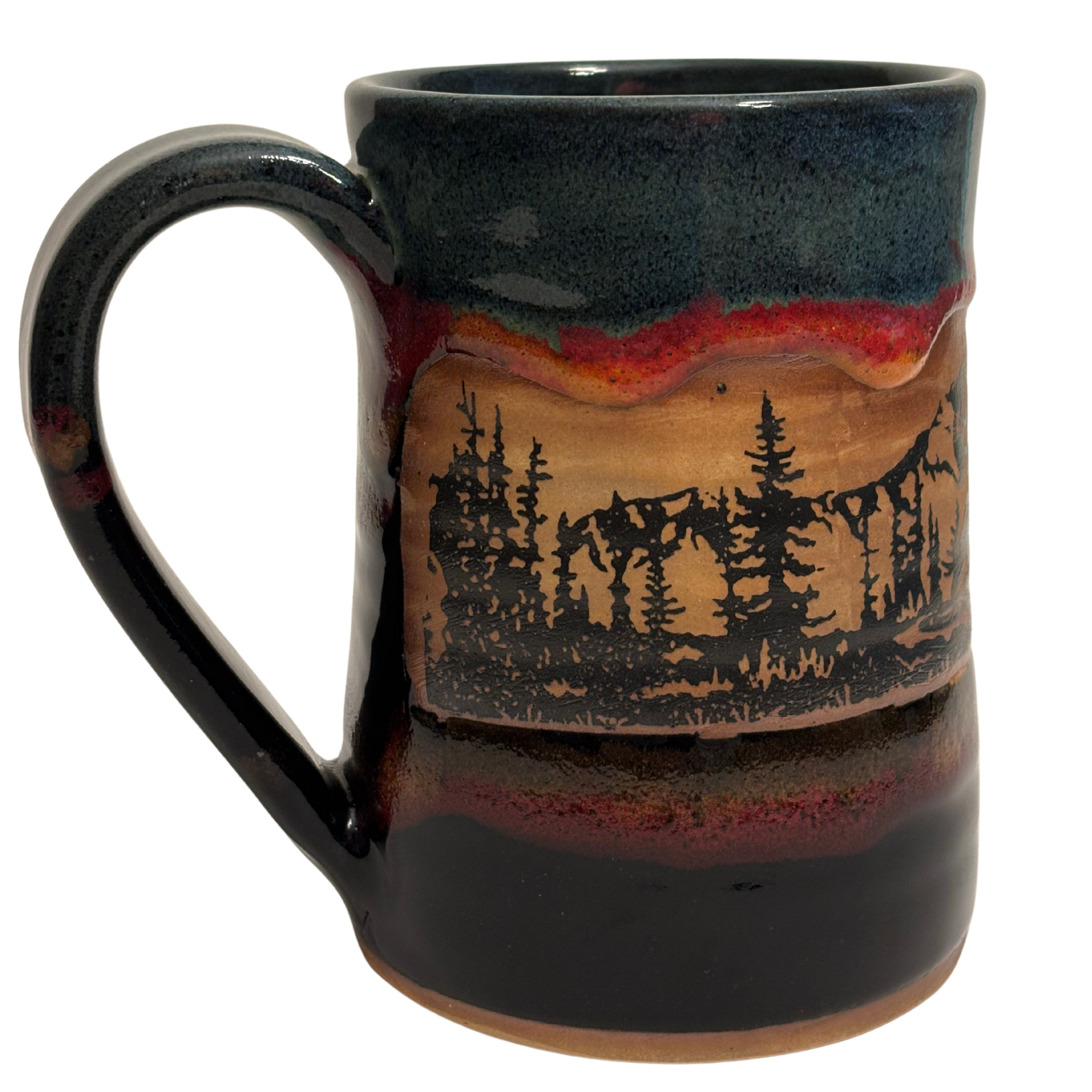 Jasper Wilderness handmade ceramic tankard with deep blue and red glaze featuring elk and forest silhouette design.