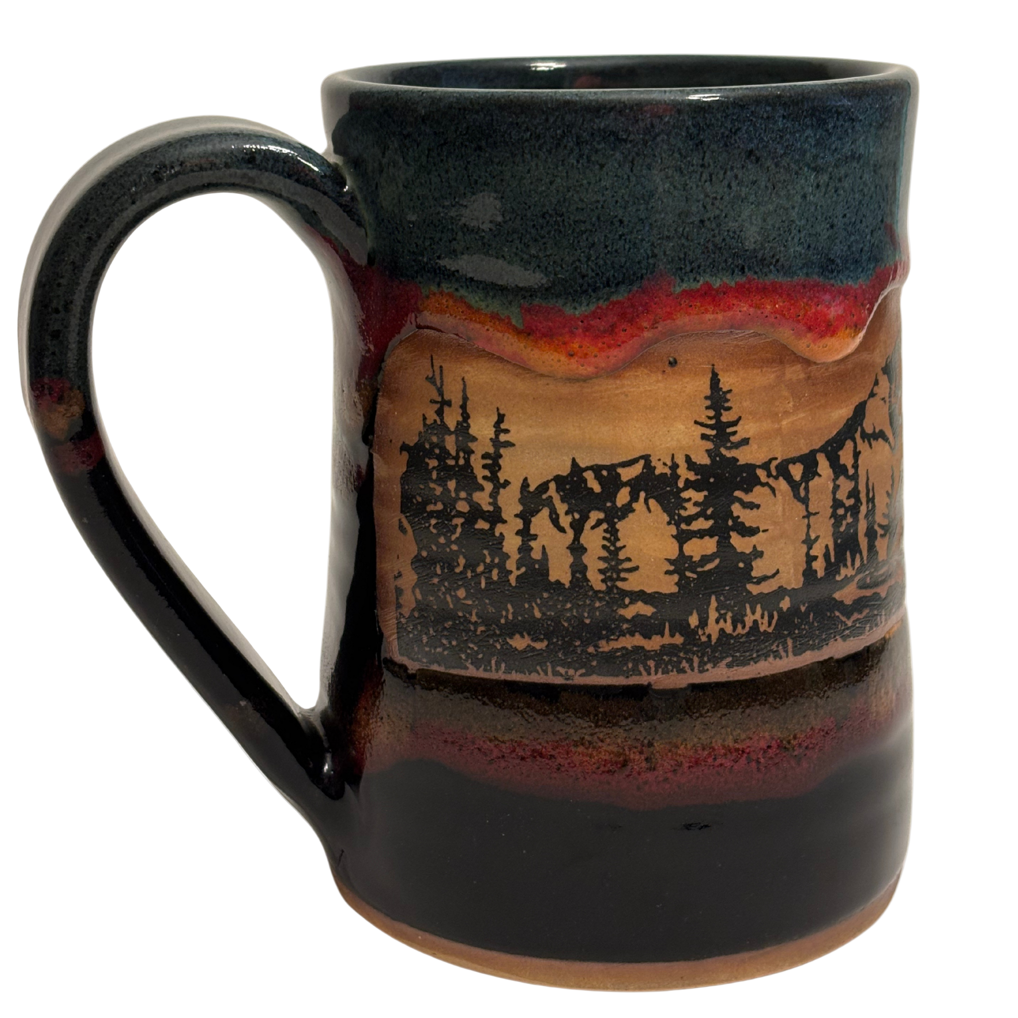 Jasper Wilderness handmade ceramic tankard with deep blue and red glaze featuring elk and forest silhouette design.