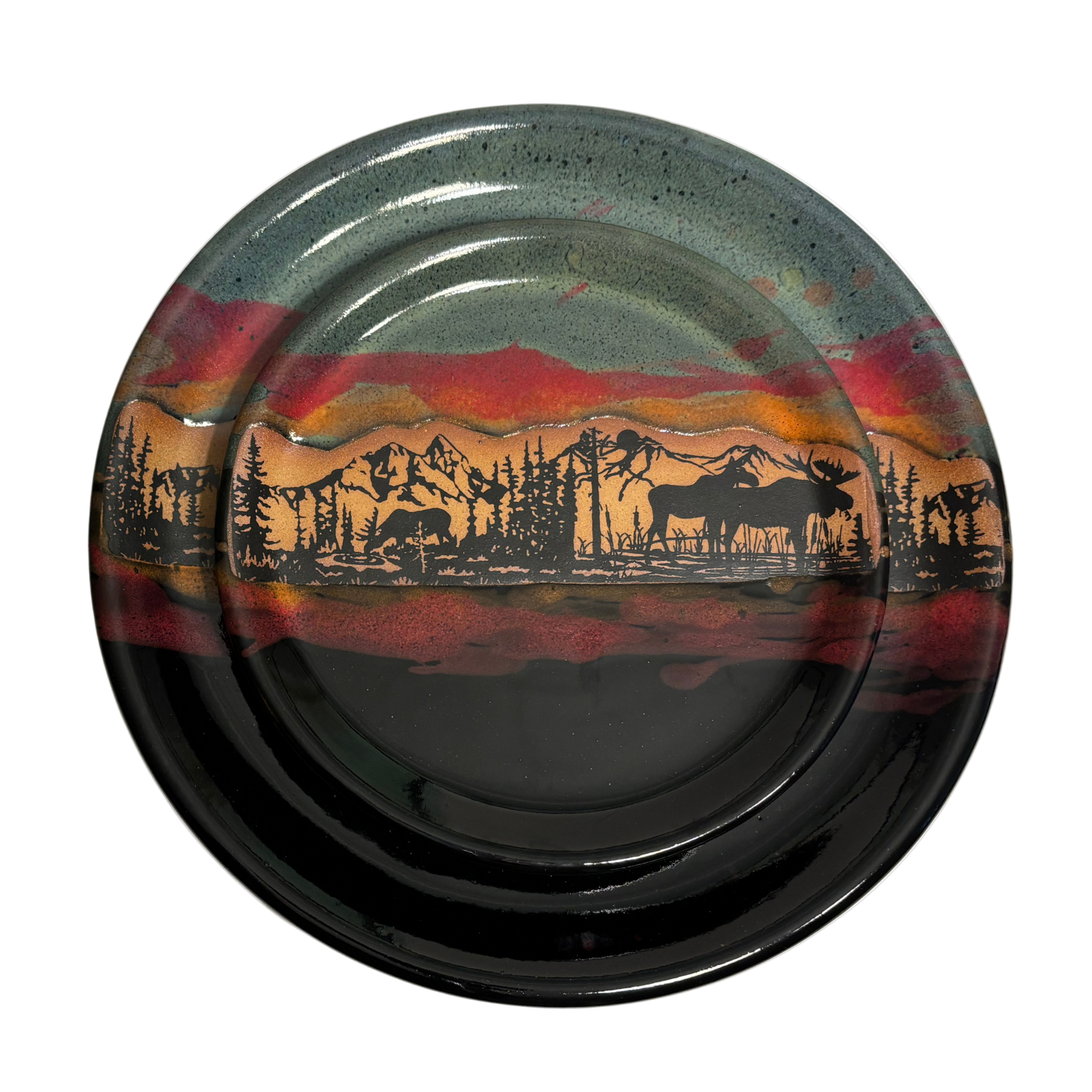 Jasper Wilderness Horizon handmade ceramic dinner & salad plates with forest, moose, and mountain silhouette on red, gold, and blue glaze.