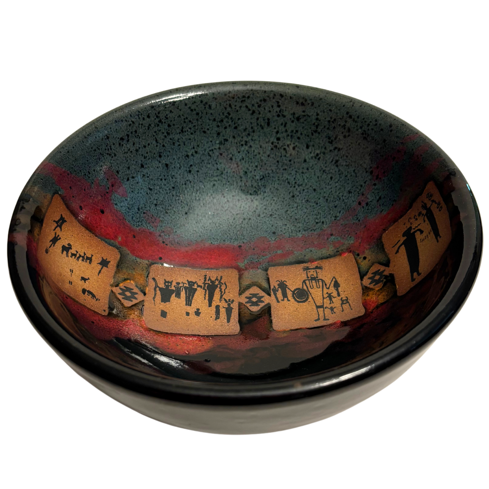Lost Cities handmade ceramic salad bowl with dark glaze and ancient petroglyph tile design in earthy tones.