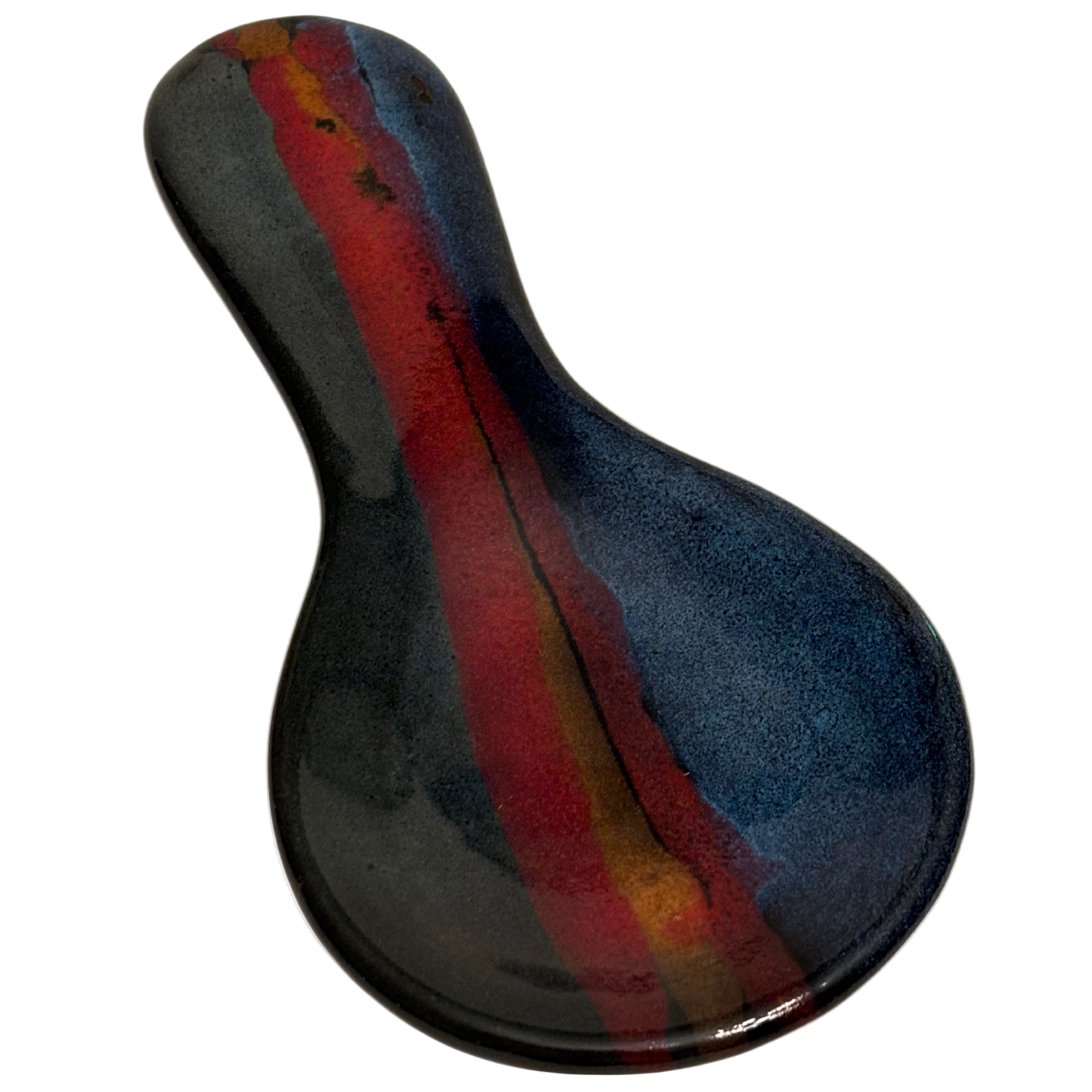 Mountain Dusk handmade ceramic spoon rest with rich layered glazes in deep blue, earthy brown, and warm red tones.