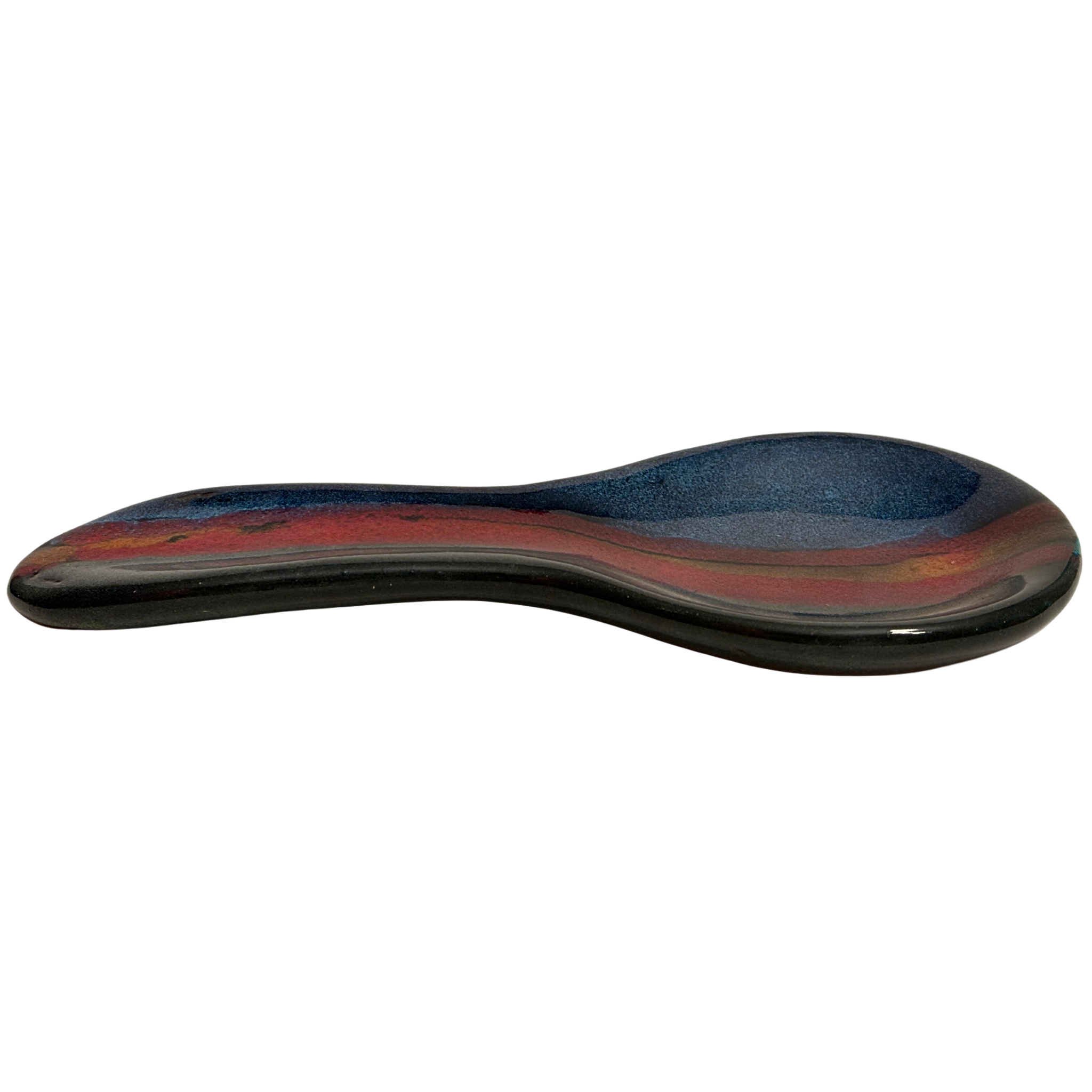 Mountain Dusk handmade ceramic spoon rest with rich layered glazes in deep blue, earthy brown, and warm red tones.