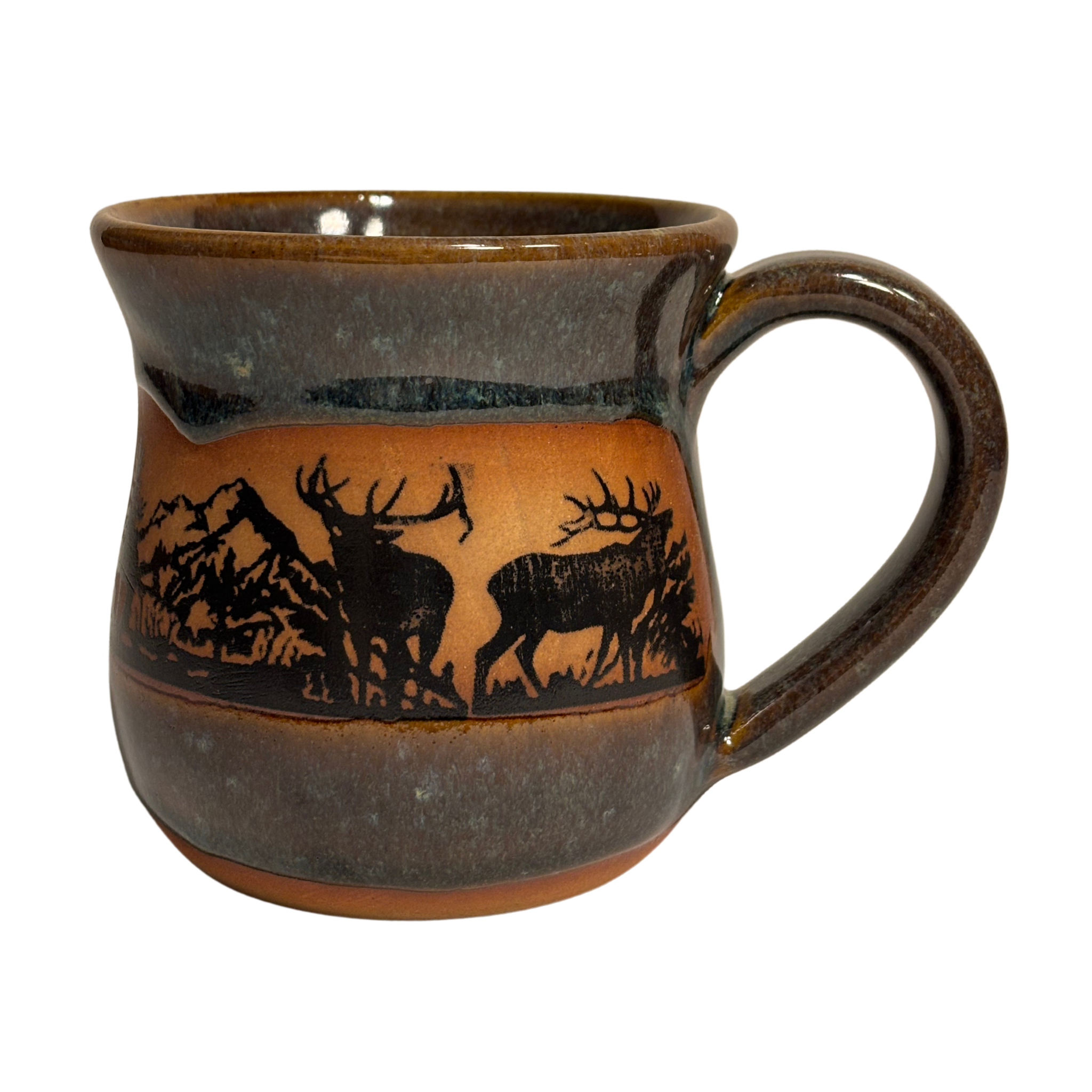 Handmade ceramic mug with elk and alpine mountain silhouette in earthy glaze