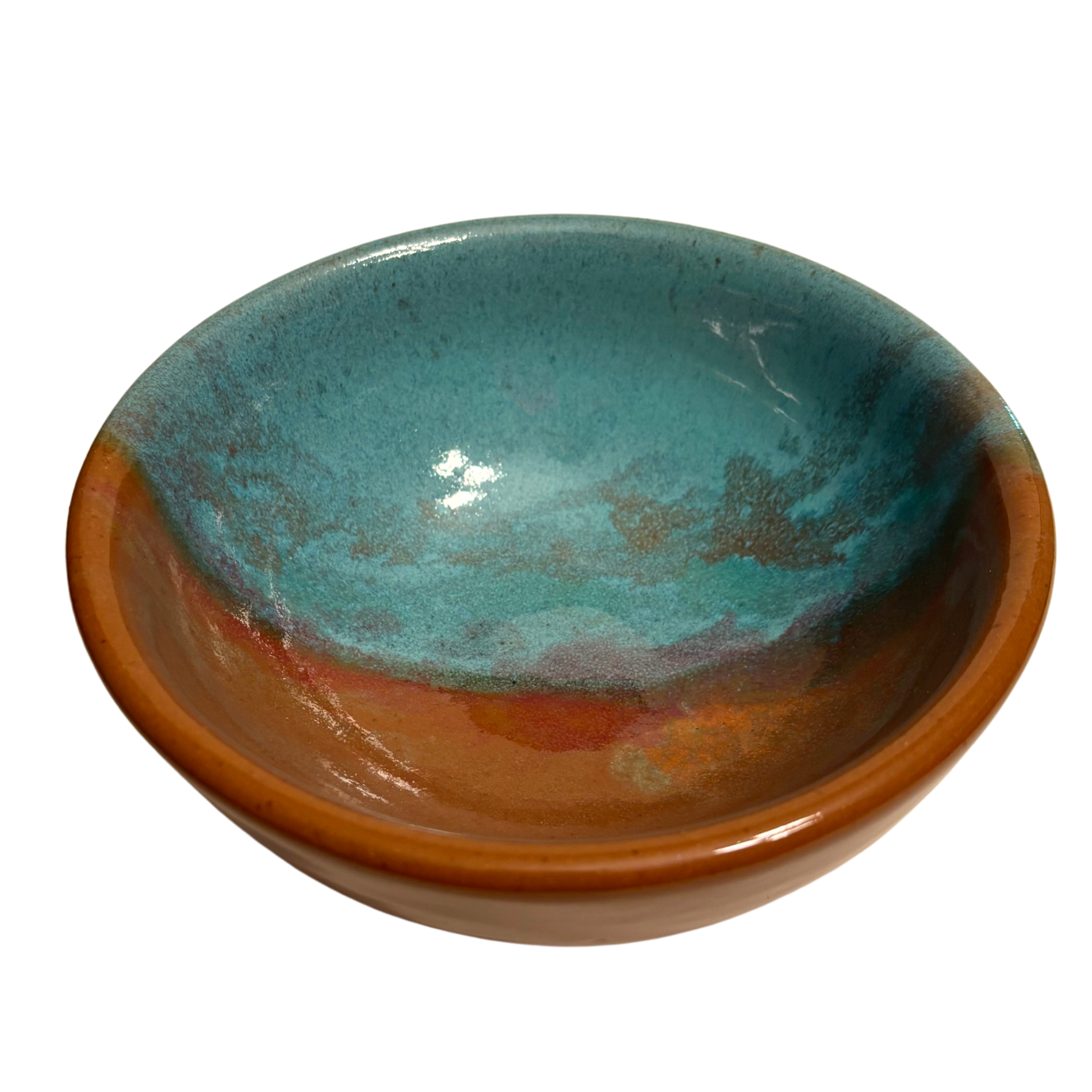 Desert Sky handmade ceramic salad bowl with turquoise interior and warm rust glaze resembling desert sunset tones.