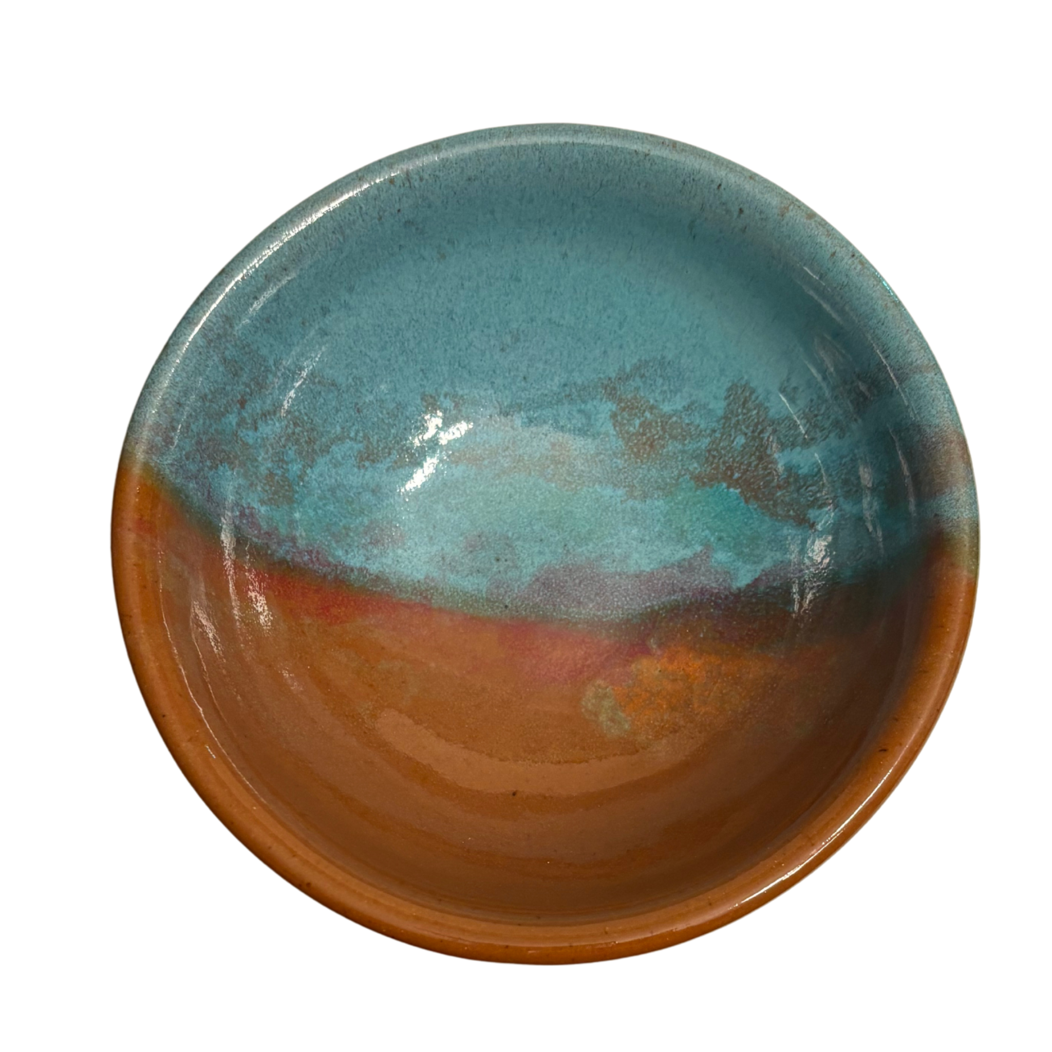 Desert Sky handmade ceramic salad bowl with turquoise interior and warm rust glaze resembling desert sunset tones.