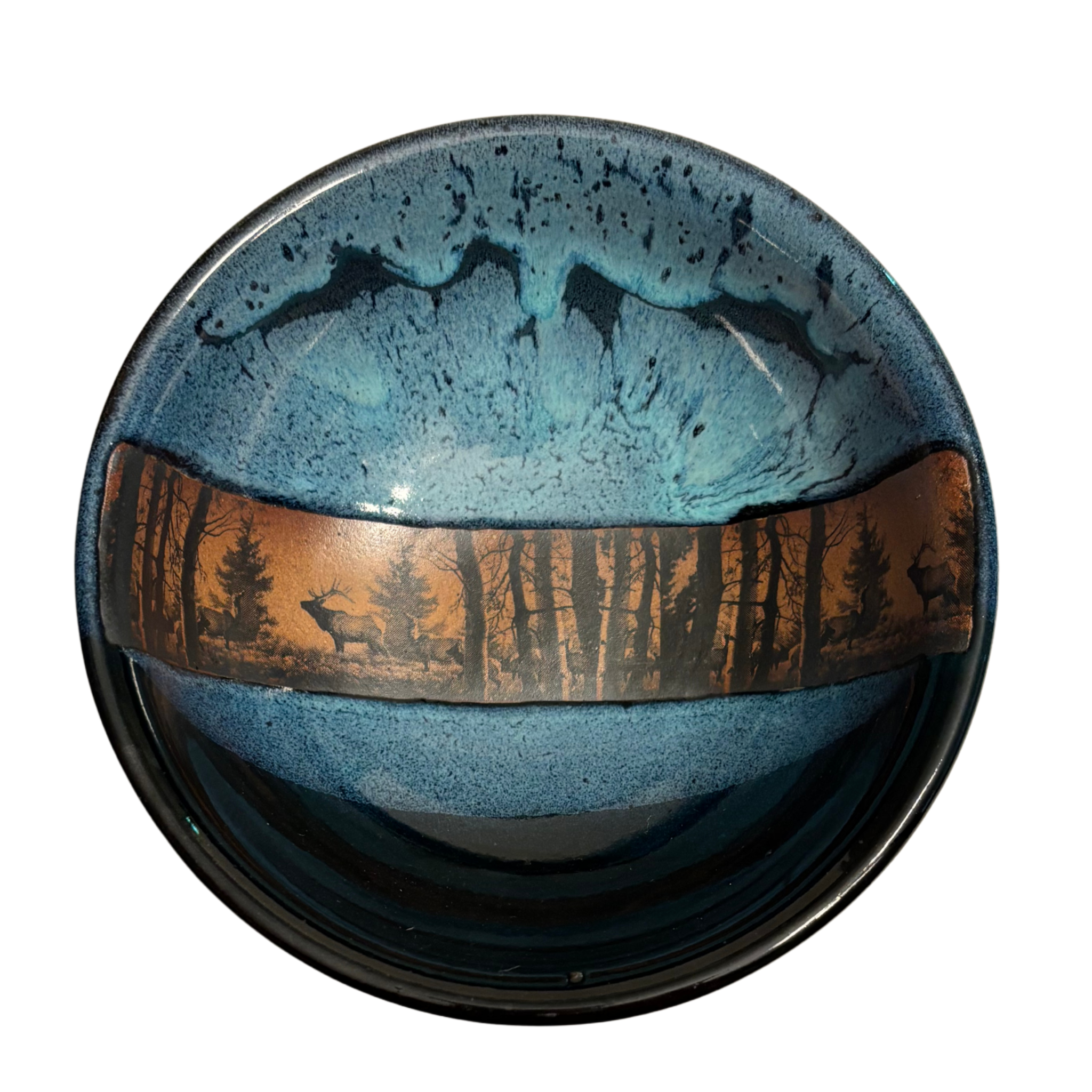 Enchanted Forest handmade ceramic salad bowl with blue glaze and woodland elk silhouette against forest landscape band.