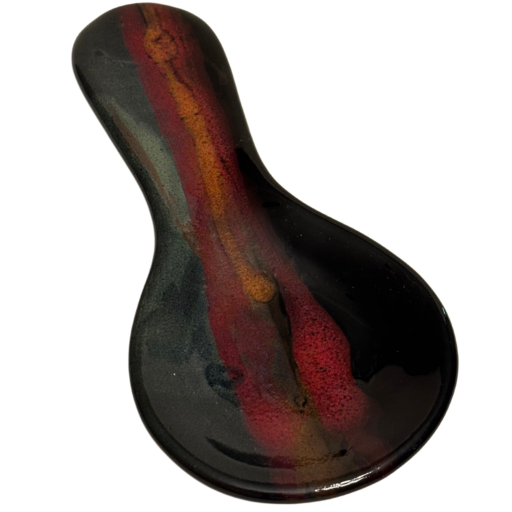 Handmade Jasper Wilderness ceramic spoon rest for kitchen counters, with black glaze, earthy red, and golden tones inspired by mountain sunsets.