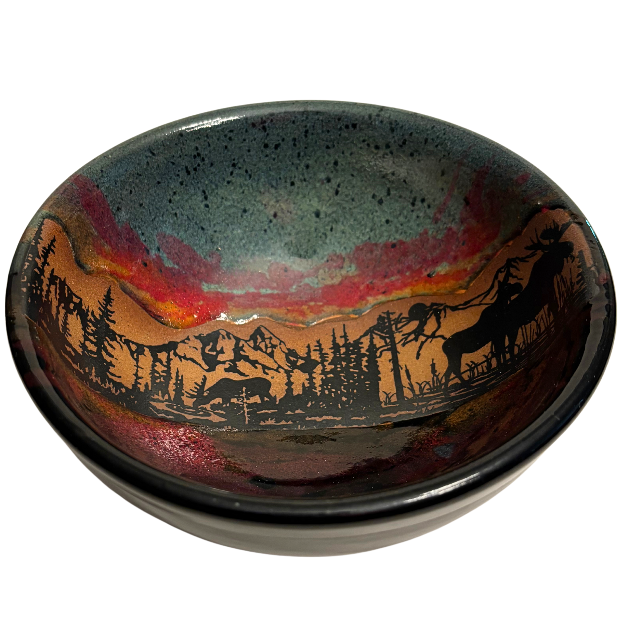 Jasper Wilderness handmade ceramic salad bowl with green and red glaze featuring elk and mountain forest silhouette design.