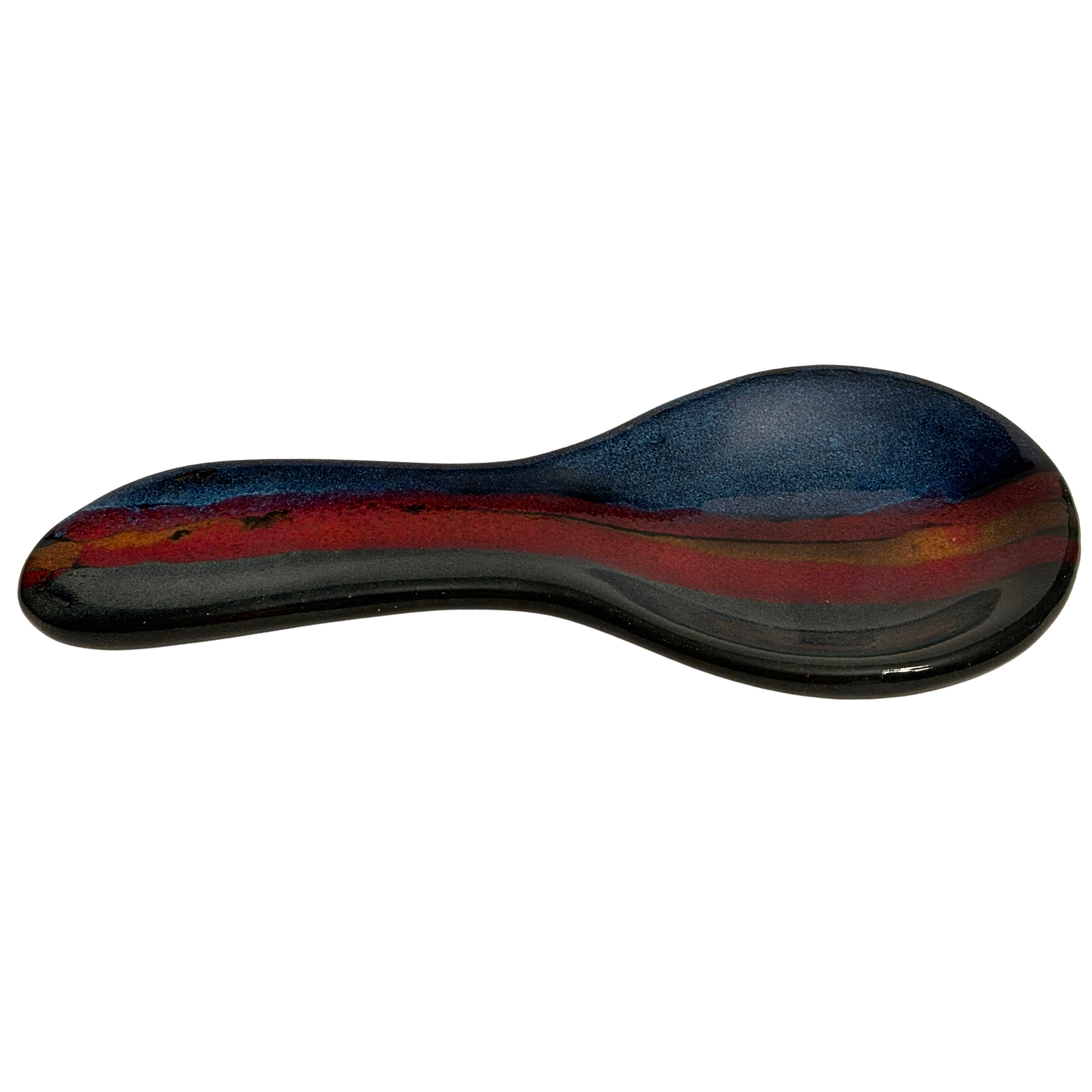 Mountain Dusk handmade ceramic spoon rest with rich layered glazes in deep blue, earthy brown, and warm red tones.