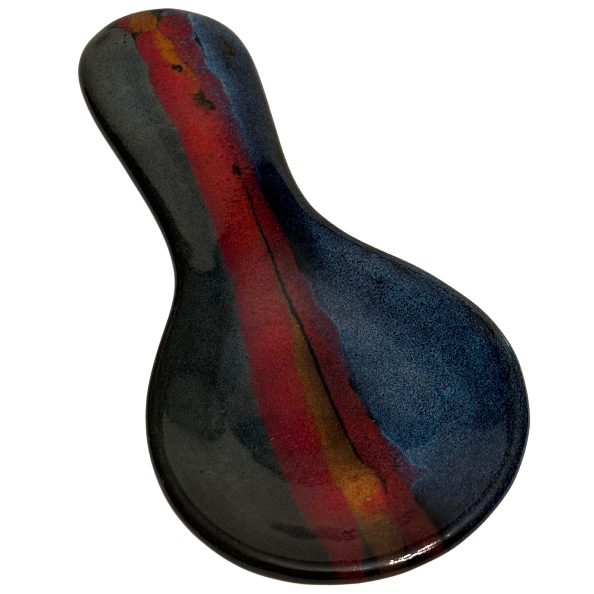 Mountain Dusk handmade ceramic spoon rest with rich layered glazes in deep blue, earthy brown, and warm red tones.