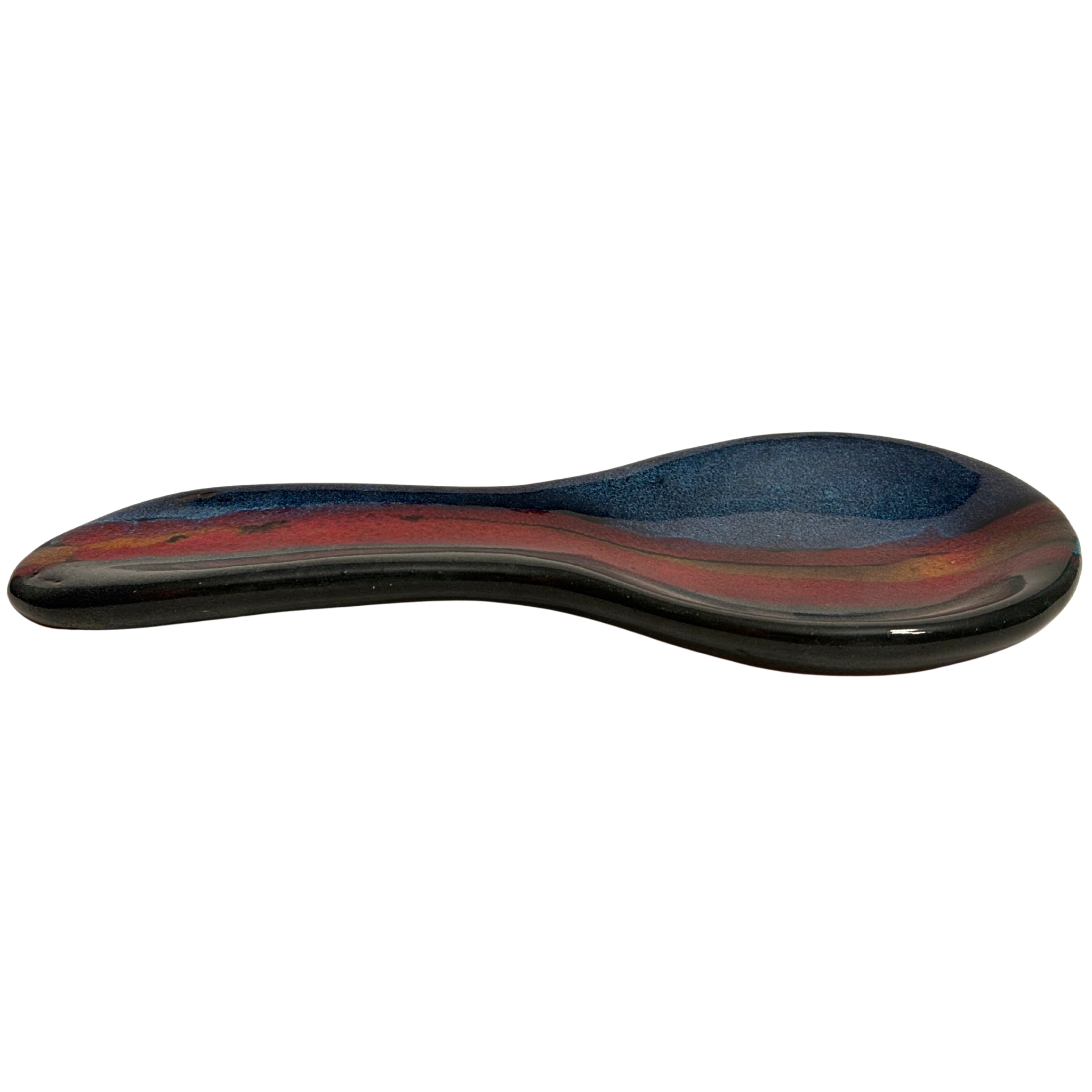 Mountain Dusk handmade ceramic spoon rest with rich layered glazes in deep blue, earthy brown, and warm red tones.